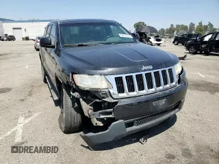 2011 Jeep Grand Cherokee Laredo with VIN 1J4RR4GG0BC563603, listed as a Copart auction lot 60237475 with 243,885 mi miles and Salvage title. Bid and sale history available at DreamBid. Image 14.