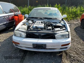 1992 Toyota Camry z VIN 4T1VK12E0NU015172, wystawiony jako Copart lot #58974095 z przebiegiem 210 163 mil mil oraz Szkoda całkowita • Salvage title. Historia ofert i sprzedaży dostępna na DreamBid. Obrazek 5.