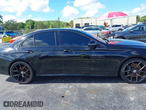 2017 Mercedes-Benz E 300 Luxury with VIN WDDZF4JB8HA054123, listed as a IAAI auction lot 39716802 with 112,008 mi miles and . Bid and sale history available at carsss.com. Image 12.