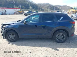 2019 Mazda CX-5 Touring with VIN JM3KFBCM8K0518806, listed as a IAAI auction lot 42038168 with 61,449 mi miles and . Bid and sale history available at DreamBid. Image 14.