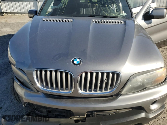 2005 BMW X5 4.4i with VIN 5UXFB53565LV15453, listed as a Copart auction lot 75830774 with 148,211 mi miles and Salvage Title. Bid and sale history available at carsss.com. Image 12.