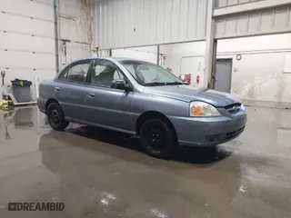 2003 Kia Rio with VIN KNADC125536274171, listed as a IAAI auction lot 41986369 with 59,837 mi miles. Bid and sale history available at carsss.com. Image 1.