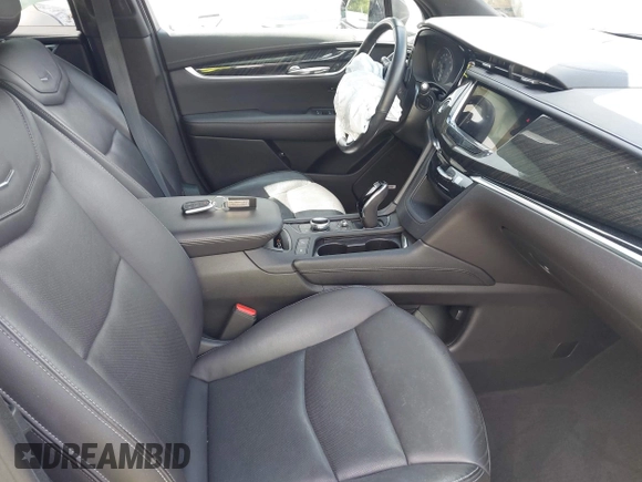 2022 Cadillac XT6 Premium Luxury with VIN 1GYKPCRS4NZ145145, listed as a IAAI auction lot 42533642 with 36,450 mi miles and . Bid and sale history available at DreamBid. Image 5.