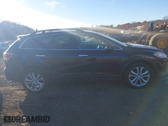 2011 Mazda CX-9 Grand Touring with VIN JM3TB3DV5B0322044, listed as a IAAI auction lot 40886500 with Not provided miles and . Bid and sale history available at DreamBid. Image 13.