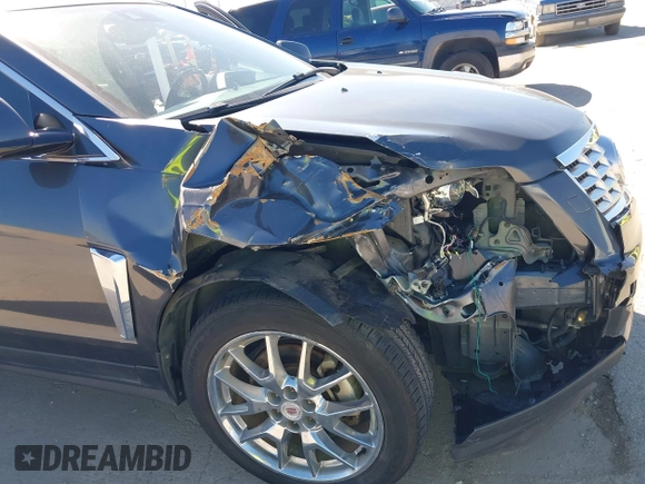 2013 Cadillac SRX Performance Collection with VIN 3GYFNDE38DS568561, listed as a IAAI auction lot 41701063 with 139,191 mi miles. Bid and sale history available at carsss.com. Image 6.