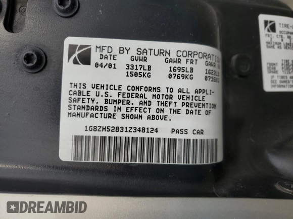 2001 Saturn SL z VIN 1G8ZH52831Z348124, wystawiony jako Copart lot #76058854 z przebiegiem 191 465 mil mil oraz Szkoda całkowita • Salvage title. Historia ofert i sprzedaży dostępna na DreamBid. Obrazek 12.
