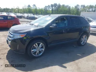 2013 Ford Edge SEL with VIN 2FMDK3JC1DBA58902, listed as a IAAI auction lot 42112569 with 184,971 mi miles. Bid and sale history available at carsss.com. Image 2.