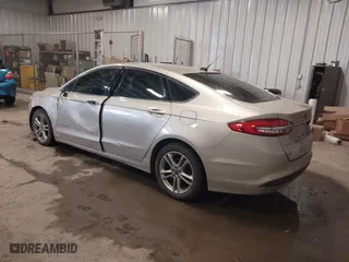 2018 Ford Fusion Hybrid S with VIN 3FA6P0UU5JR100377, listed as a IAAI auction lot 41300284 with 108,936 mi miles. Bid and sale history available at carsss.com. Image 3.