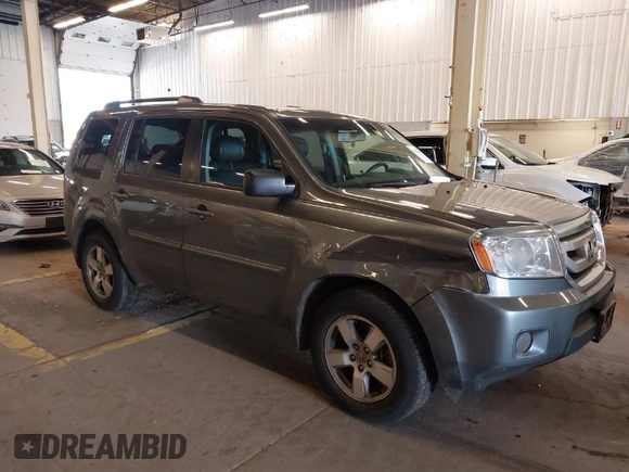 2011 Honda Pilot EX-L with VIN 5FNYF4H65BB020721, listed as a IAAI auction lot 41794436 with 113,630 mi miles and . Bid and sale history available at carsss.com. Image 1.