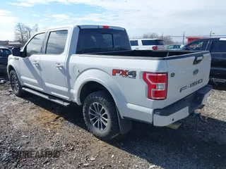 2018 Ford F-150 XL with VIN 1FTEW1E5XJFE20779, listed as a IAAI auction lot 41705616 with 138,996 mi miles and . Bid and sale history available at DreamBid. Image 3.