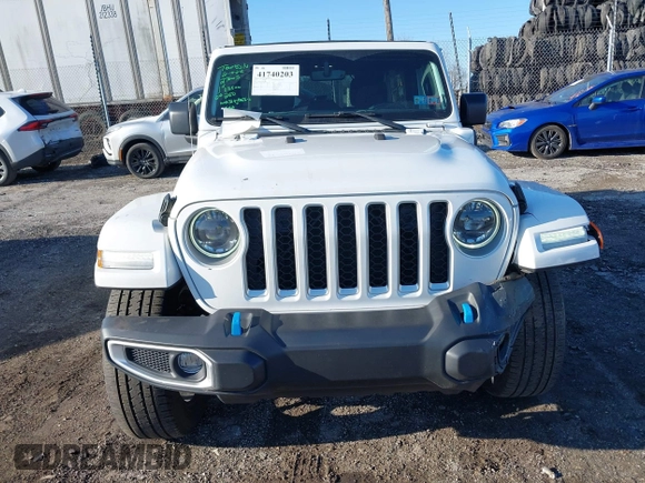2023 Jeep Wrangler Sahara z VIN 1C4JJXP6XPW579817, wystawiony jako IAAI lot #41740203 z przebiegiem 19 716 mil mil oraz . Historia ofert i sprzedaży dostępna na DreamBid. Obrazek 12.
