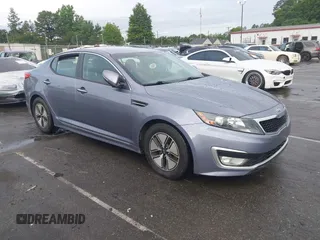 2011 Kia Optima EX Hybrid z VIN KNAGM4AD8B5002951, wystawiony jako IAAI lot #42462401 z przebiegiem 198 079 mil mil oraz . Historia ofert i sprzedaży dostępna na DreamBid. Obrazek 1.