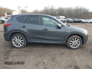2015 Mazda CX-5 Grand Touring with VIN JM3KE4DY5F0470445, listed as a IAAI auction lot 41236468 with 87,845 mi miles. Bid and sale history available at carsss.com. Image 13.
