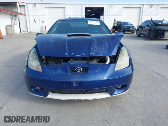 2002 Toyota Celica GT with VIN JTDDR32T220113449, listed as a IAAI auction lot 41546615 with 247,392 mi miles. Bid and sale history available at carsss.com. Image 12.