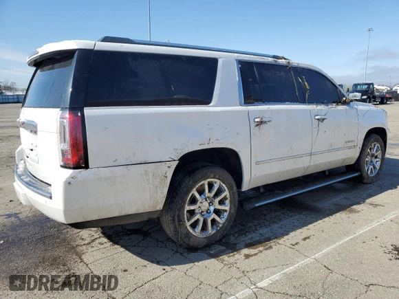 2017 GMC Yukon XL Denali with VIN 1GKS2HKJ5HR139365, listed as a Copart auction lot 52140725 with 135,079 mi miles and Salvage Title. Bid and sale history available at carsss.com. Image 3.