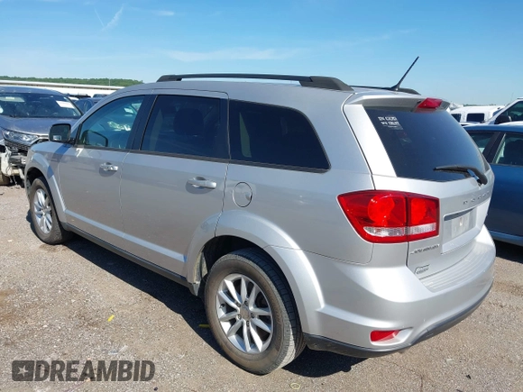 2014 Dodge Journey SXT with VIN 3C4PDCBG8ET118998, listed as a IAAI auction lot 42177885 with 165,247 mi miles. Bid and sale history available at carsss.com. Image 3.