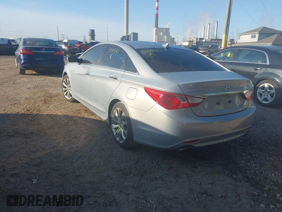 2012 Hyundai Sonata SE with VIN 5NPEC4AB7CH330570, listed as a IAAI auction lot 42108128 with 124,439 mi miles and . Bid and sale history available at carsss.com. Image 3.