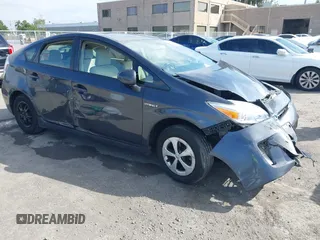 2012 Toyota Prius One z VIN JTDKN3DU2C1589933, wystawiony jako IAAI lot #42213248 z przebiegiem 218 847 mil mil oraz . Historia ofert i sprzedaży dostępna na DreamBid. Obrazek 1.