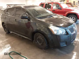 2010 Pontiac Vibe w/1SB with VIN 5Y2SP6E02AZ410781, listed as a IAAI auction lot 40984876 with 235,317 mi miles. Bid and sale history available at carsss.com. Image 1.