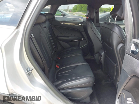 2018 Lincoln MKC Premiere with VIN 5LMCJ1C94JUL08589, listed as a IAAI auction lot 42133449 with 90,827 mi miles and . Bid and sale history available at DreamBid. Image 8.