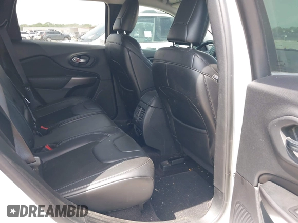 2019 Jeep Cherokee Latitude Plus with VIN 1C4PJLLBXKD220221, listed as a IAAI auction lot 42060125 with 89,452 mi miles and . Bid and sale history available at DreamBid. Image 8.