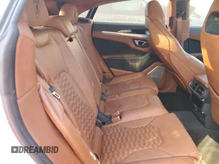 2022 Lamborghini Urus z VIN ZPBUA1ZL8NLA22604, wystawiony jako Copart lot #77174164 z przebiegiem Nie podano mil oraz Szkody całkowita. Historia ofert i sprzedaży dostępna na DreamBid. Obrazek 10.