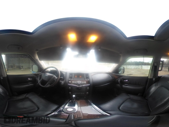 2012 Infiniti QX56 8-passenger with VIN JN8AZ2ND1C9715021, listed as a IAAI auction lot 41893659 with 170,969 mi miles and . Bid and sale history available at DreamBid. Image 20.