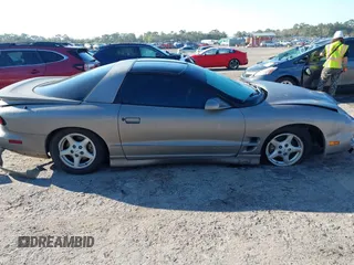 2000 Pontiac Firebird with VIN 2G2FS22K0Y2112410, listed as a IAAI auction lot 41676541 with 129,857 mi miles. Bid and sale history available at carsss.com. Image 13.