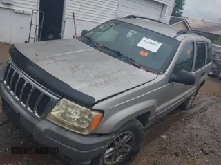 2003 Jeep Grand Cherokee Laredo z VIN 1J4GW48S33C599693, wystawiony jako IAAI lot #42228885 z przebiegiem 257 551 mil mil oraz . Historia ofert i sprzedaży dostępna na DreamBid. Obrazek 2.