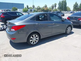 2013 Hyundai Accent GLS z VIN KMHCU4AE9DU427450, wystawiony jako IAAI lot #42415750 z przebiegiem 105 890 mil mil oraz . Historia ofert i sprzedaży dostępna na DreamBid. Obrazek 4.