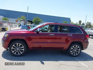 2017 Jeep Grand Cherokee Overland with VIN 1C4RJFCTXHC676236, listed as a IAAI auction lot 42164645 with 94,658 mi miles and . Bid and sale history available at DreamBid. Image 14.