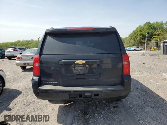 2019 Chevrolet Suburban LT with VIN 1GNSCHKC2KR167309, listed as a Copart auction lot 54475565 with 140,552 mi miles and Salvage Title. Bid and sale history available at DreamBid. Image 6.
