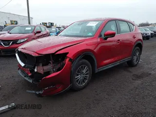 2019 Mazda CX-5 Sport with VIN JM3KFBBM7K1574764, listed as a IAAI auction lot 41276424 with 28,901 mi miles and . Bid and sale history available at carsss.com. Image 2.
