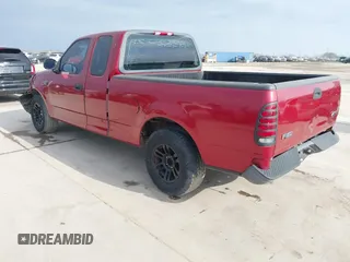 2003 Ford F-150 XL with VIN 1FTRX17213NB65093, listed as a IAAI auction lot 41568065 with 286,293 mi miles. Bid and sale history available at carsss.com. Image 3.