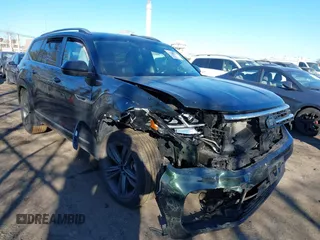 2022 Volkswagen Atlas SEL R-Line z VIN 1V2AR2CA9NC505811, wystawiony jako IAAI lot #41458521 z przebiegiem 32 621 mil mil oraz . Historia ofert i sprzedaży dostępna na DreamBid. Obrazek 1.