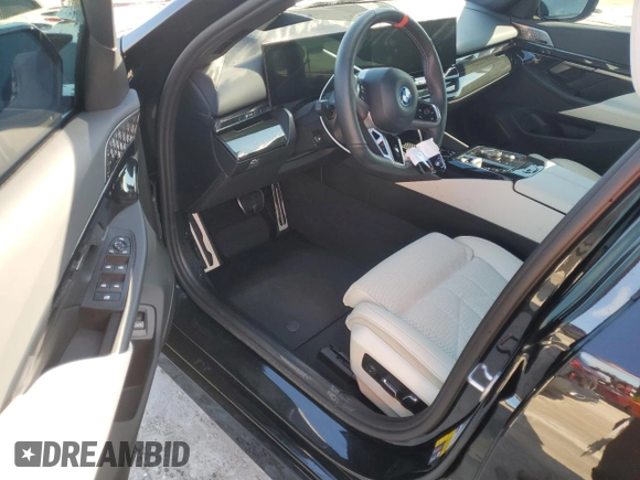2024 BMW i5 M60 z VIN WBY43FK00RCP12947, wystawiony jako Copart lot #73754024 z przebiegiem Nie podano mil oraz Szkoda całkowita • Salvage title. Historia ofert i sprzedaży dostępna na DreamBid. Obrazek 8.