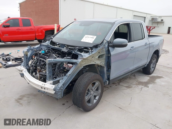 2023 Honda Ridgeline RTL with VIN 5FPYK3F58PB047099, listed as a IAAI auction lot 42313390 with Not provided miles and . Bid and sale history available at DreamBid. Image 23.