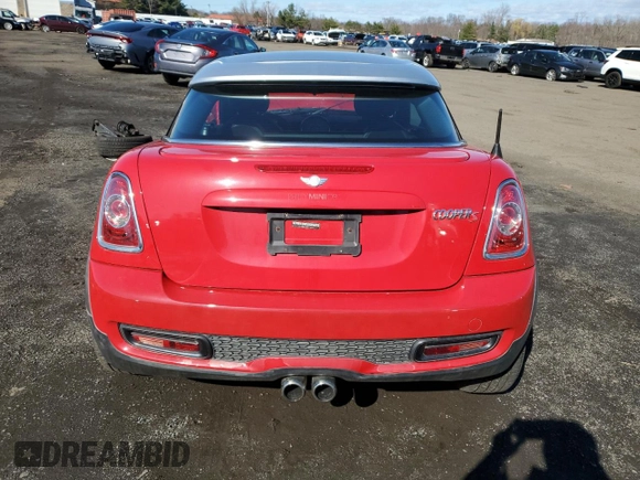 2012 MINI Coupe S z VIN WMWSX3C54CT154692, wystawiony jako Copart lot #45290325 z przebiegiem Nie podano mil oraz Szkoda całkowita • Salvage title. Historia ofert i sprzedaży dostępna na DreamBid. Obrazek 6.