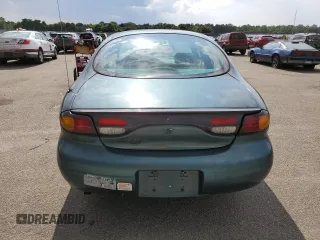 1997 Ford Taurus GL with VIN 1FALP52U4VA323402, listed as a Copart auction lot 65742235 with 43,415 mi miles and Clean title. Bid and sale history available at DreamBid. Image 6.