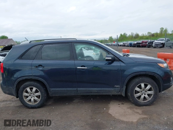 2013 Kia Sorento LX with VIN 5XYKTCA67DG405003, listed as a IAAI auction lot 42253887 with 197,093 mi miles and . Bid and sale history available at DreamBid. Image 14.