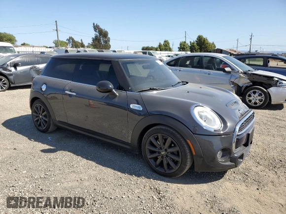 2017 MINI Hardtop Cooper S with VIN WMWXP7C30H2A46582, listed as a Copart auction lot 55466795 with 54,644 mi miles and Salvage title. Bid and sale history available at DreamBid. Image 4.