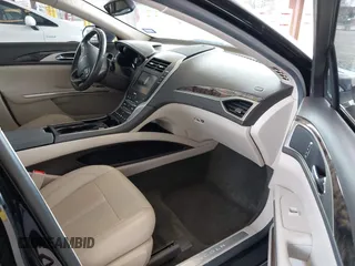 2016 Lincoln MKZ Hybrid with VIN 3LN6L2LUXGR628147, listed as a IAAI auction lot 41815863 with 97,961 mi miles. Bid and sale history available at carsss.com. Image 5.