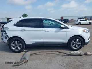 2019 Ford Edge SEL with VIN 2FMPK3J97KBC26735, listed as a IAAI auction lot 42482687 with 54,466 mi miles and . Bid and sale history available at DreamBid. Image 14.