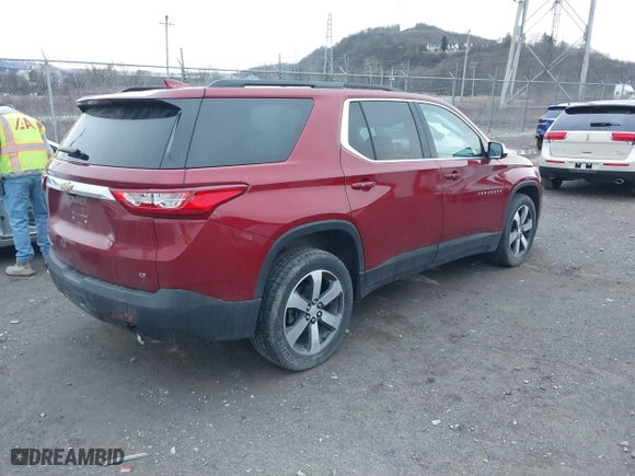 2019 Chevrolet Traverse LT Leather with VIN 1GNEVHKW1KJ164692, listed as a IAAI auction lot 41800874 with 76,866 mi miles. Bid and sale history available at carsss.com. Image 4.