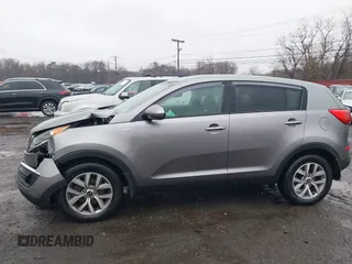 2014 Kia Sportage LX with VIN KNDPBCAC0E7601636, listed as a IAAI auction lot 41832978 with 145,353 mi miles and . Bid and sale history available at carsss.com. Image 17.
