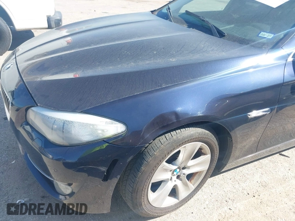 2013 BMW 5 Series 528i with VIN WBAXG5C56DD232046, listed as a IAAI auction lot 41799500 with 114,811 mi miles and . Bid and sale history available at carsss.com. Image 6.
