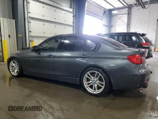 2014 BMW 3 Series 335i xDrive with VIN WBA3B9C59EP458568, listed as a Copart auction lot 61133085 with 177,009 mi miles and Salvage title. Bid and sale history available at DreamBid. Image 2.