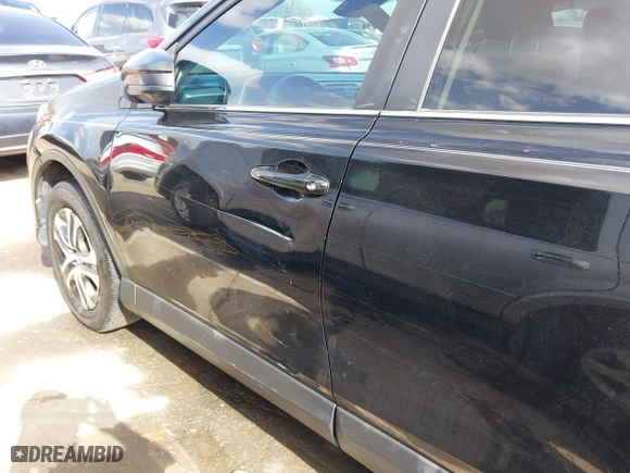 2018 Toyota RAV4 LE with VIN 2T3ZFREV9JW457062, listed as a IAAI auction lot 41696609 with 96,716 mi miles. Bid and sale history available at carsss.com. Image 19.