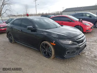 2018 Honda Civic Hatchback Sport Touring with VIN SHHFK7H94JU225667, listed as a IAAI auction lot 41686122 with 52,896 mi miles. Bid and sale history available at carsss.com. Image 1.
