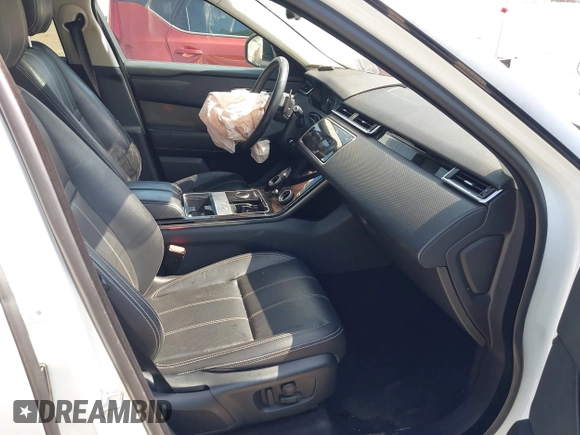2020 Land Rover Range Rover Velar S z VIN SALYB2EX7LA252141, wystawiony jako IAAI lot #42131779 z przebiegiem 101 612 mil mil oraz . Historia ofert i sprzedaży dostępna na DreamBid. Obrazek 5.